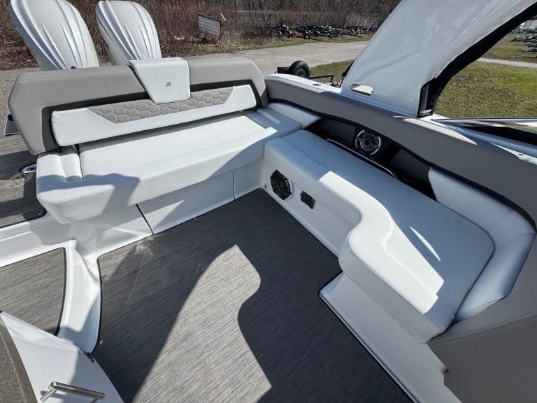Four Winns H290 boat interior with spacious seating and modern design.