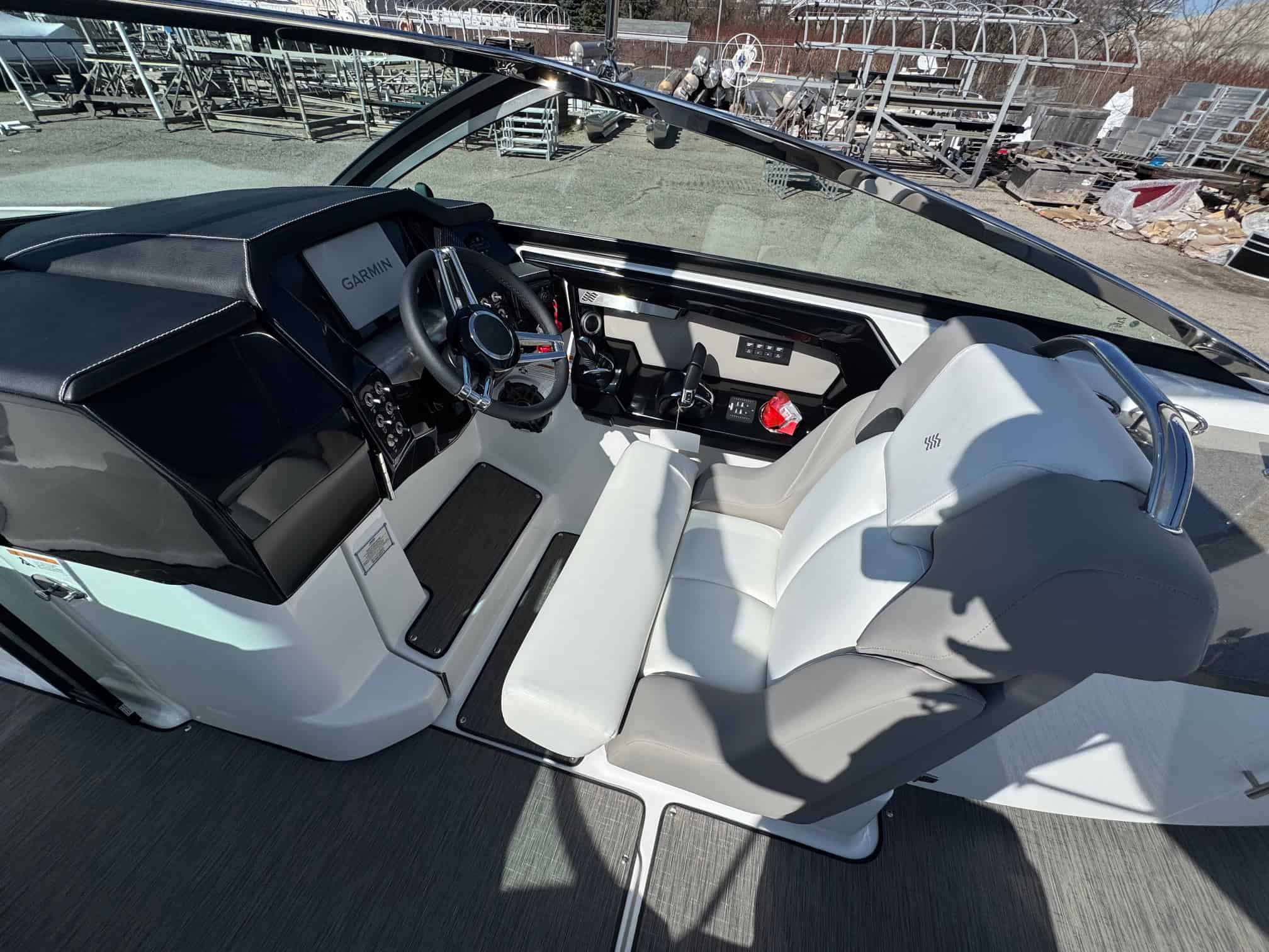 Interior view of the 2025 Four Winns H290 boat at Hall's Sport Center.