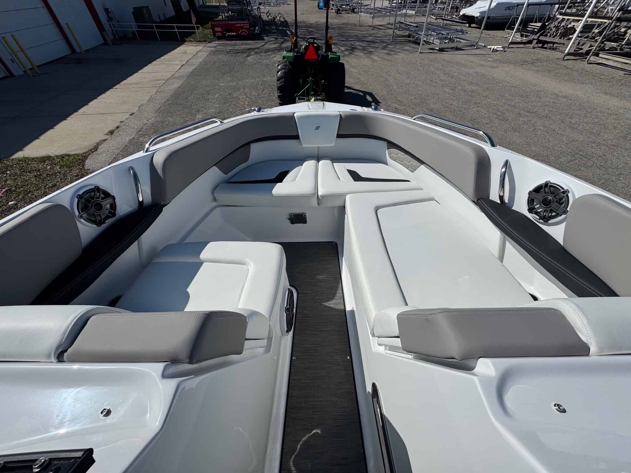 Luxury boat interior with spacious seating and modern design.