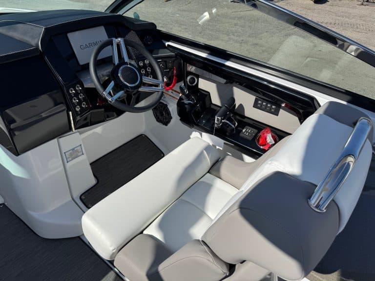 Luxury boat helm with modern controls and navigation system.