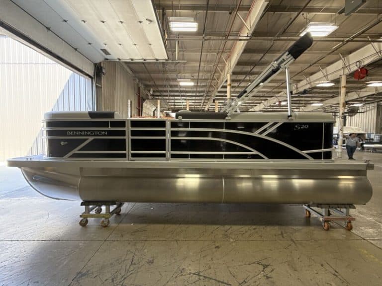 Bennington 20SL S1 pontoon boat inside Hall's Sport Center showroom.