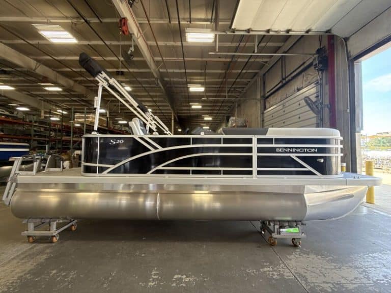 Bennington 20SL S1 pontoon boat inside Hall's Sport Center showroom.