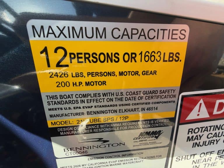 Bennington 22 MSB boat maximum capacity label at Hall's Sport Center.
