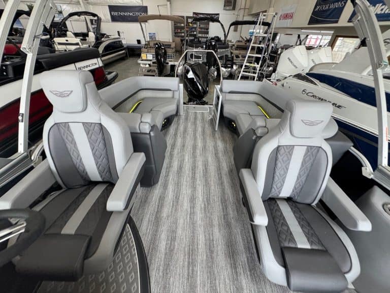 Modern Bennington 24 MFB pontoon boat displayed at Hall's Sport Center showroom.