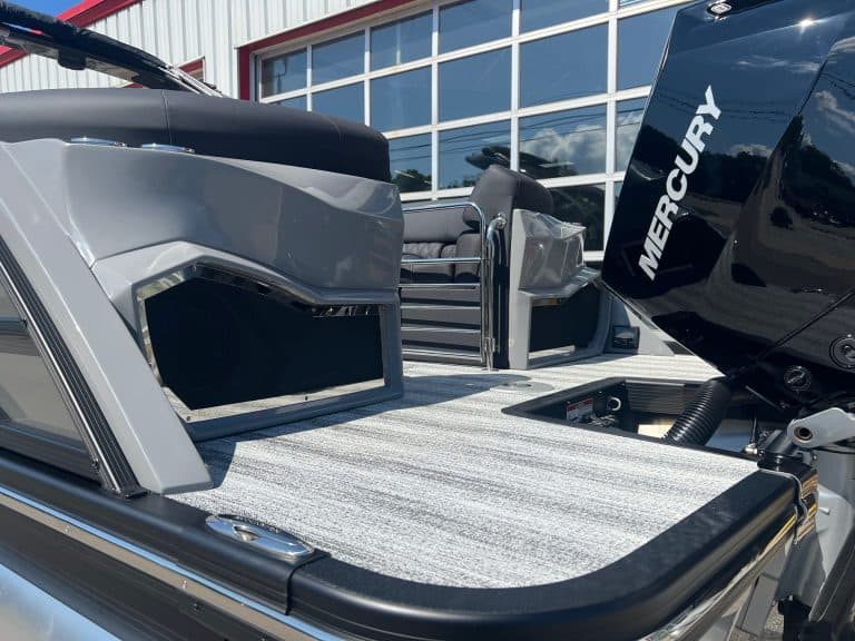 Bennington 25 QFBA pontoon boat with Mercury outboard motor at Hall's Sport Center.