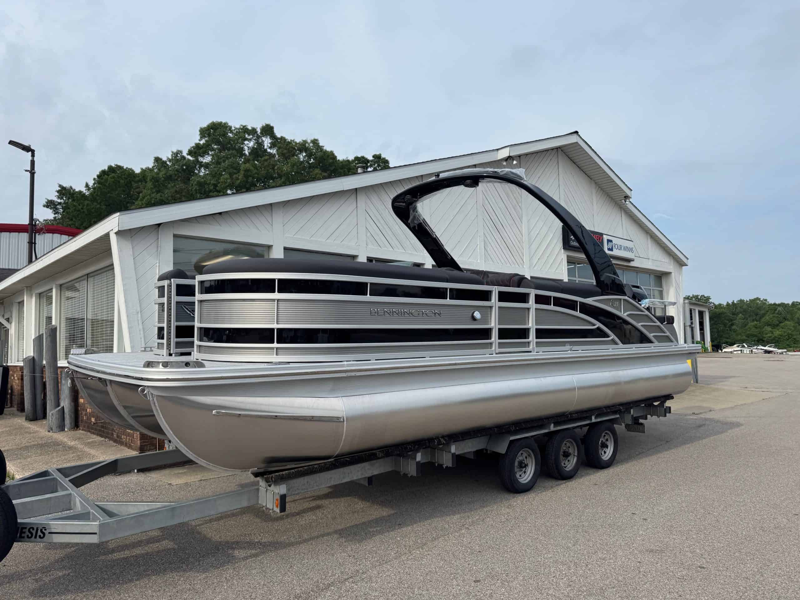 Bennington 25 RSBA pontoon boat at Hall's Sport Center dealership.