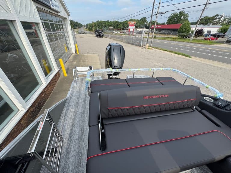 Bennington 25 RSBA boat displayed outside Hall's Sport Center dealership.