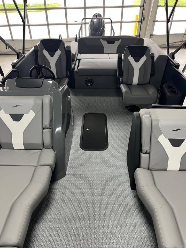Versatile pontoon boat interior with spacious seating and modern design.