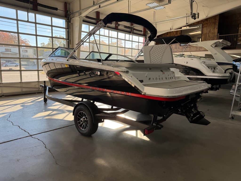 Luxury boat for sale at Hall's Sport Center. Perfect for water adventures and family outings.