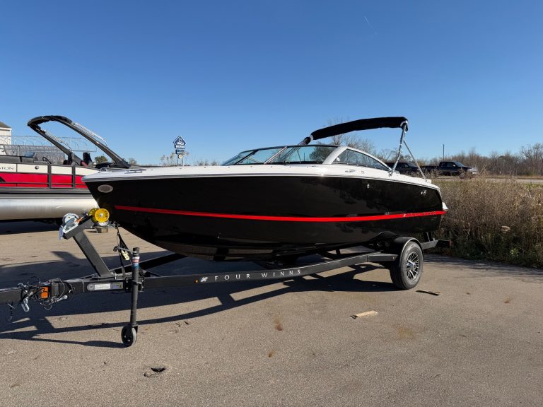 Four Winns H1 Freedom boat on trailer at Hall's Sport Center.