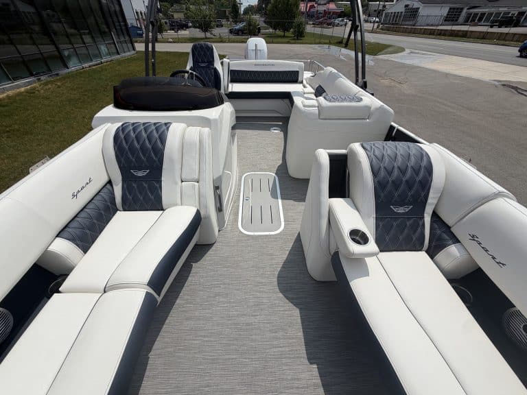 Premium white pontoon boat with black accents at Hall's Sport Center.