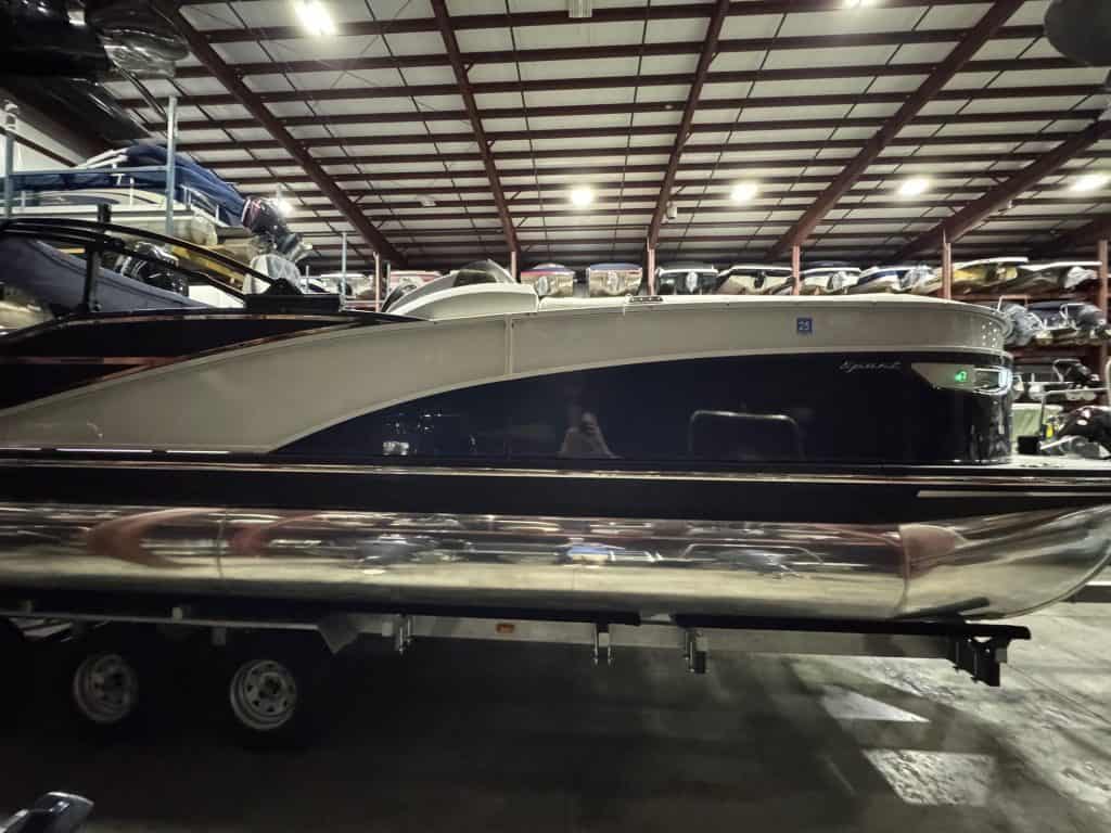 Bennington 23 RXSB pontoon boat displayed at Hall's Sport Center dealership.