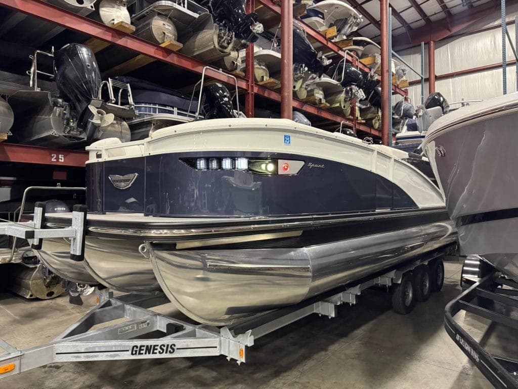 High-quality Bennington 23 RXSB pontoon boat displayed at Hall's Sport Center. Perfect for family ou.