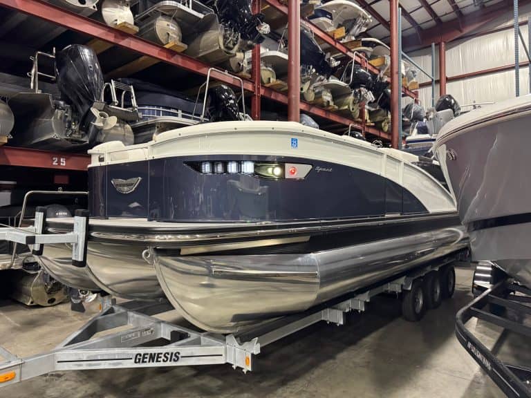High-quality Bennington 23 RXSB pontoon boat displayed at Hall's Sport Center. Perfect for family ou.