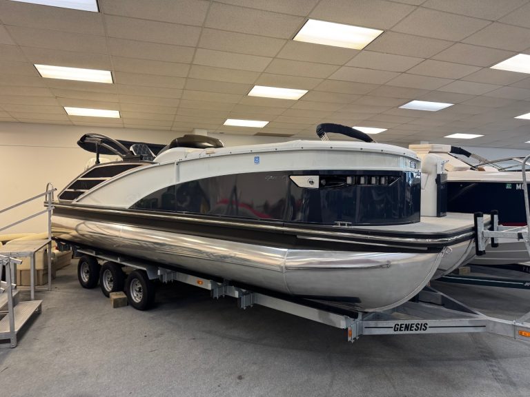 Bennington 23 RXSB luxury pontoon boat on display at Hall's Sport Center. Perfect for family outings.