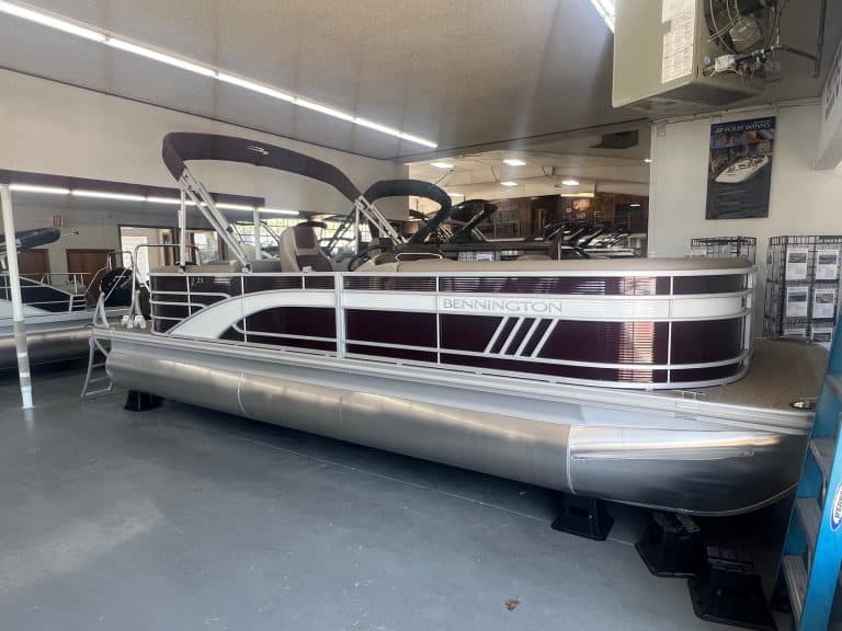 Bennington 23 LSR pontoon boat displayed at Hall's Sport Center.
