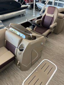 Helm seat and control console of the 2023 Bennington 23 LSR pontoon boat.