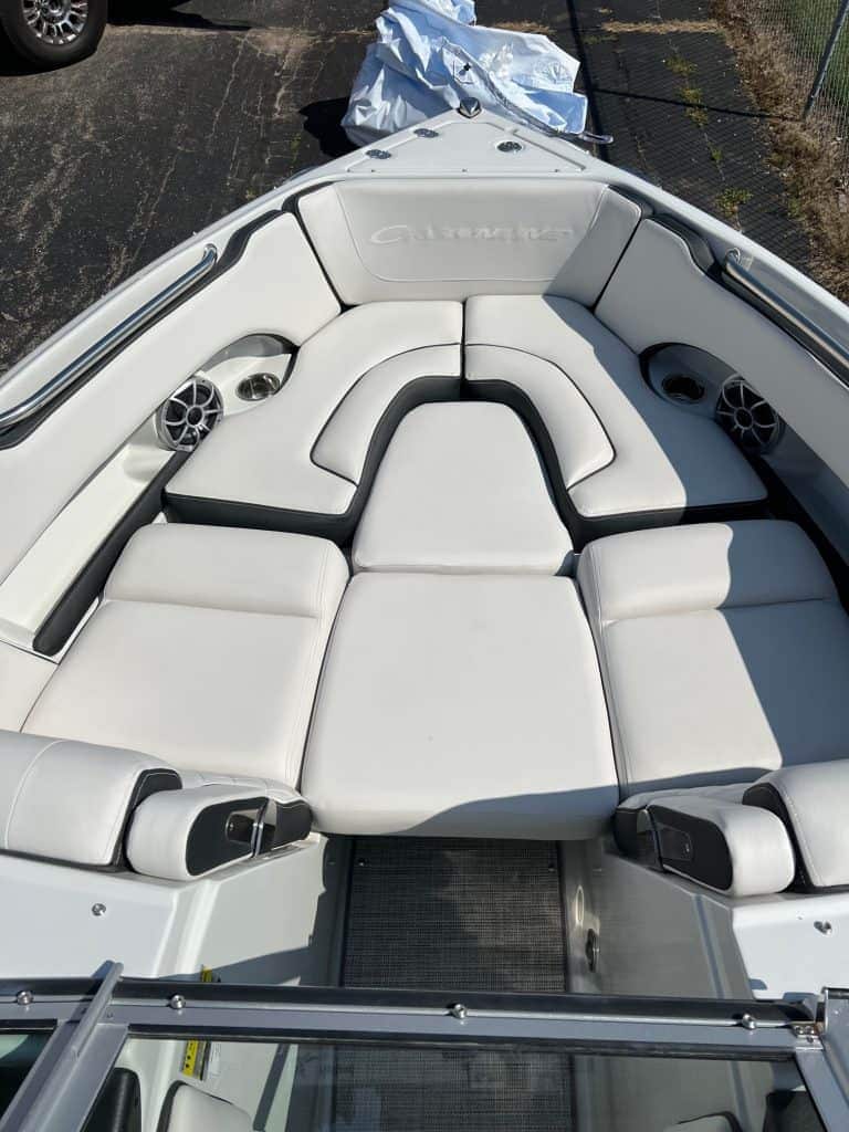 Crownline 240 SS boat interior with plush white seating and modern design.