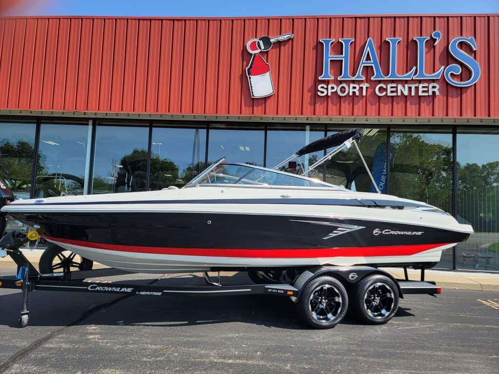 Luxury Crownline 240 SS boat displayed outside Hall's Sport Center for 2024 model showcase.