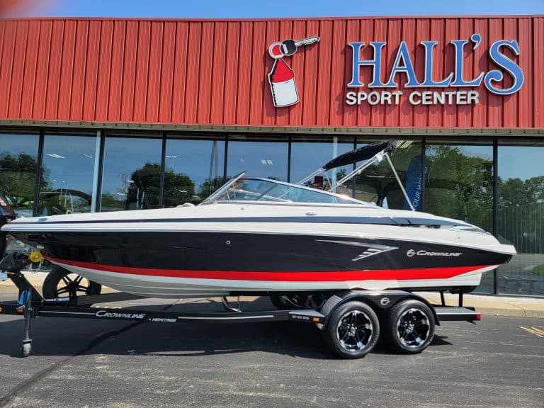 Luxury Crownline 240 SS boat displayed outside Hall's Sport Center for 2024 model showcase.