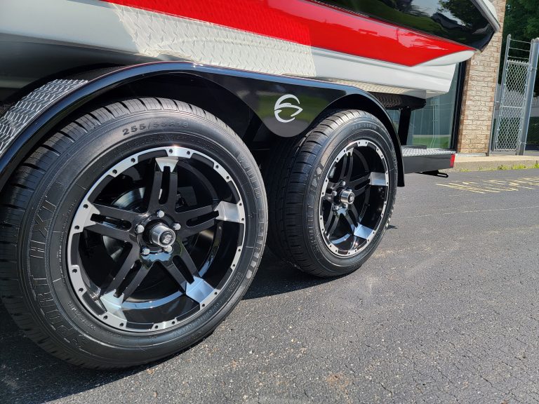 Close-up of the Crownline 240 SS boat wheels at Hall's Sport Center dealership.