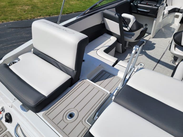 Modern Crownline 240 SS boat with sleek white and black seating, displayed at Hall's Sport Center.