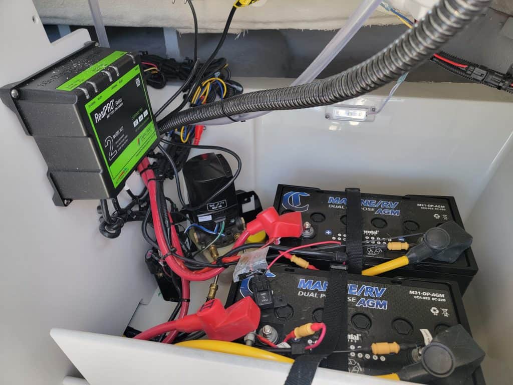 Battery and electrical system setup at Hall's Sport Center for 2024 Crownline 240 SS.