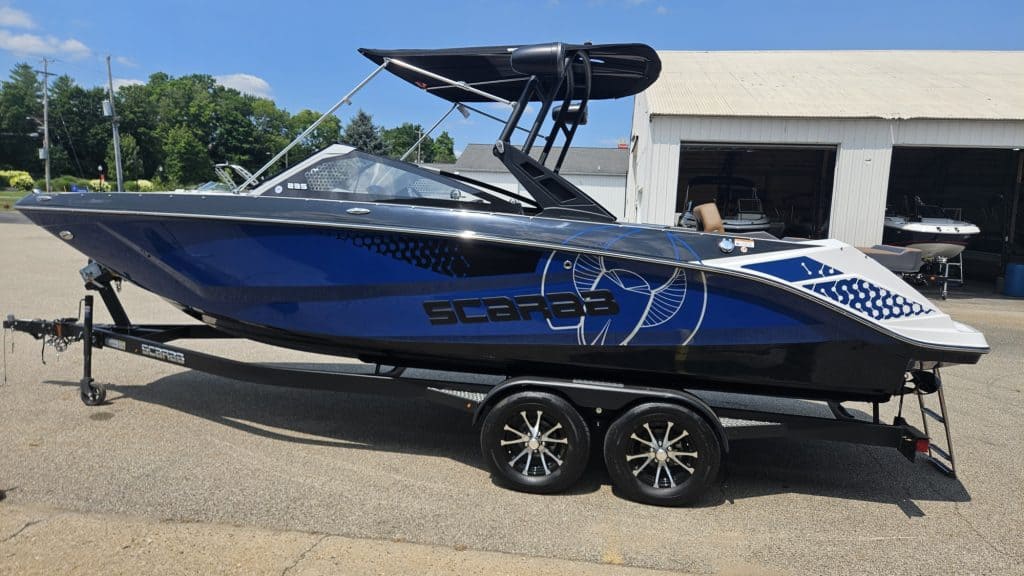 Scarab 235 ID speedboat on trailer at Hall's Sport Center.