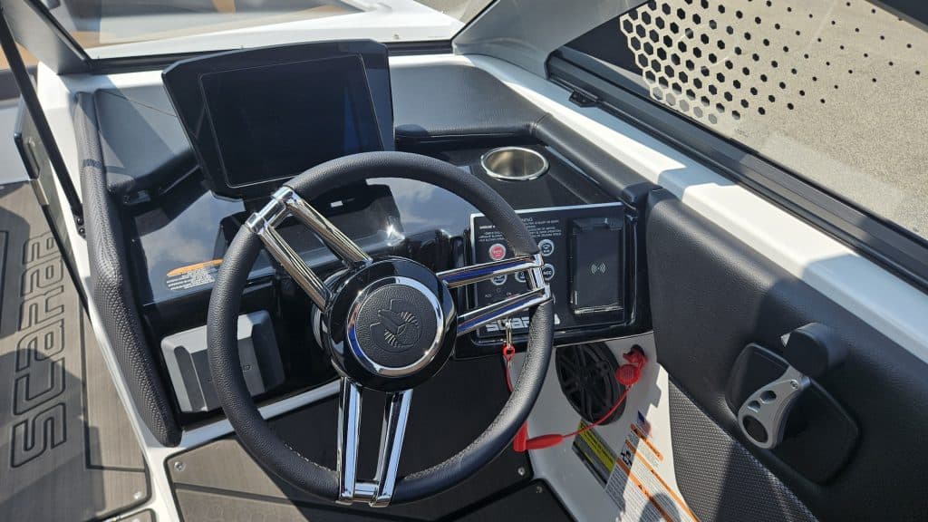 Interior view of the 2024 Scarab 235 ID boat at Hall's Sport Center.