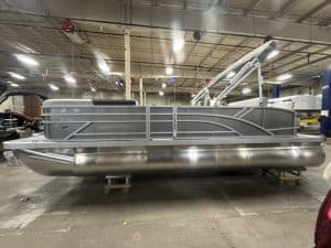 Pontoon boat for sale at Hall's Sport Center, ideal for family outings and fishing trips.