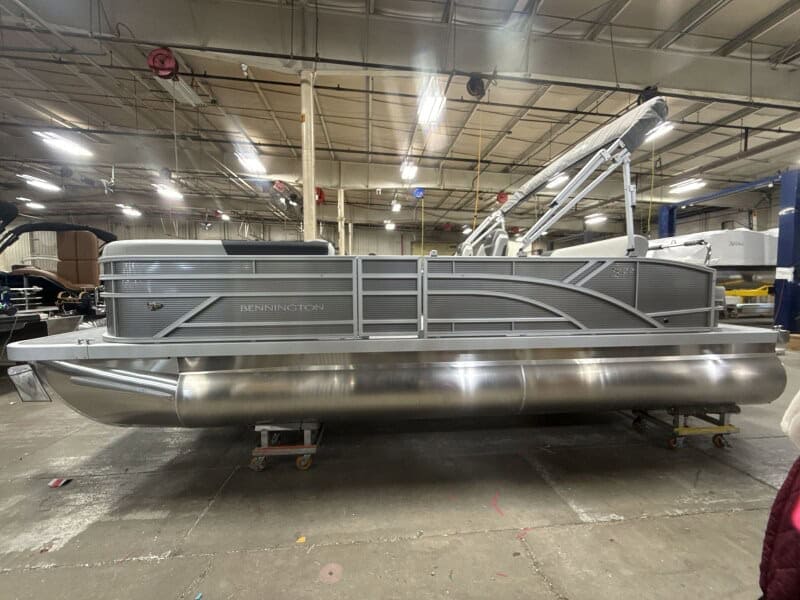 Pontoon boat for sale at Hall's Sport Center, ideal for family outings and fishing trips.