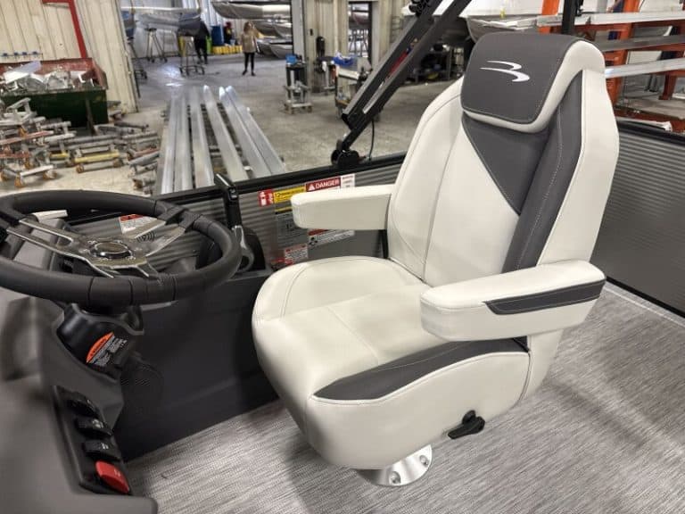 Bennington 22 S1SB pontoon boat in showroom at Hall's Sport Center.