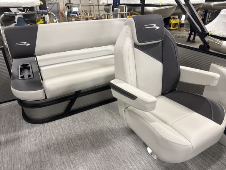 Modern Bennington 22 S1SB boat seats displayed at Hall's Sport Center.