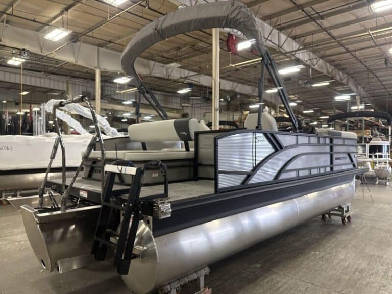 Bennington 22 S1SB pontoon boat displayed at Hall's Sport Center, ideal for family boating and water.