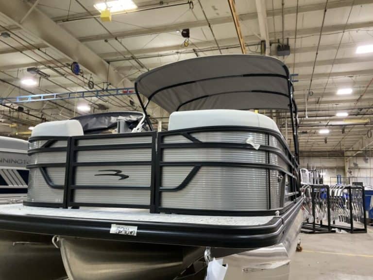 Pontoon boat at Hall's Sport Center, ideal for family outings and water adventures.
