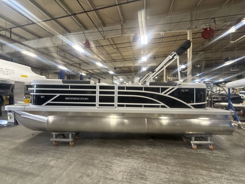Bennington 22 SSR pontoon boat at Hall's Sport Center showroom.