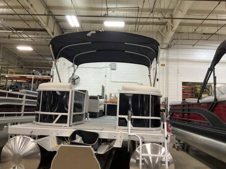 Bennington 22 SSR pontoon boat for sale at Hall's Sport Center. Perfect for lakes and family outings.