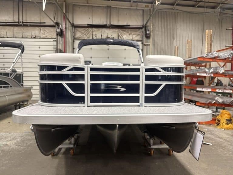 Modern Bennington 22 SSR pontoon boat displayed at Hall's Sport Center.