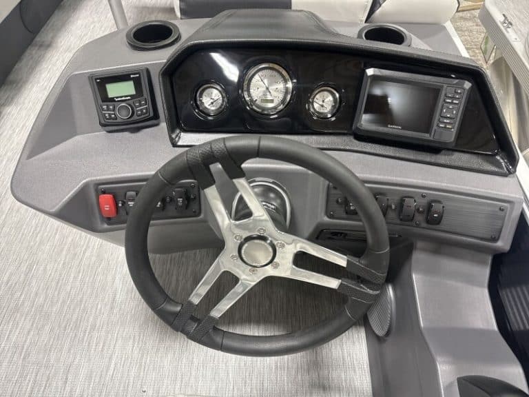 Dashboard of a Bennington 22 SSR pontoon boat at Hall's Sport Center.