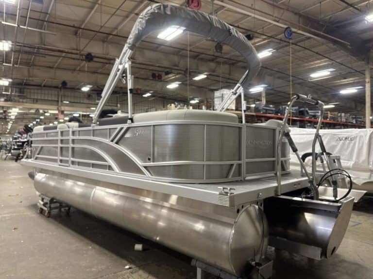 Modern Bennington 22 SSR pontoon boat displayed at Hall's Sport Center.