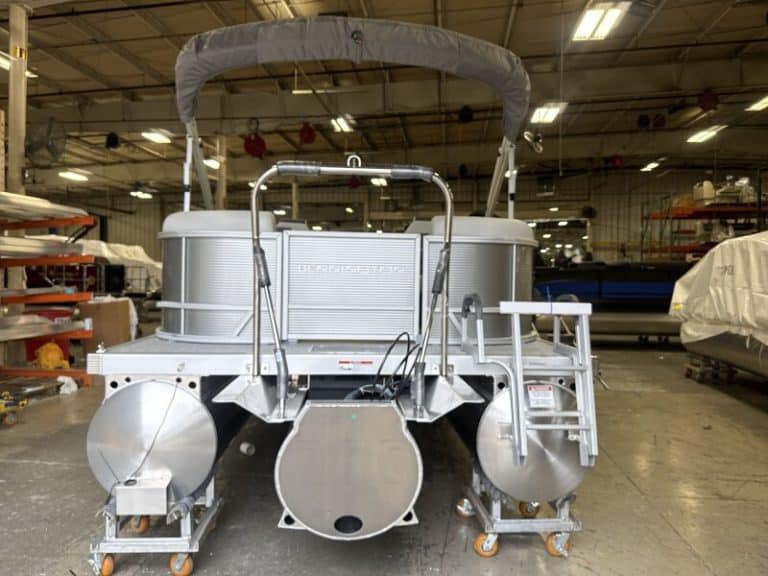 Bennington 22 SSR pontoon boat in showroom at Hall's Sport Center.