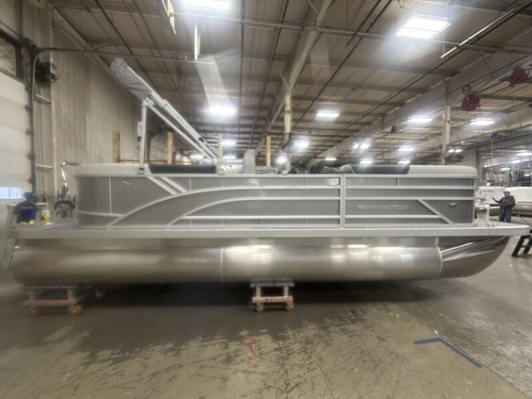 New Bennington 22 SSR pontoon boat displayed at Hall's Sport Center showroom.