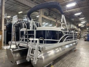 Pontoon boat at Hall's Sport Center, ideal for leisure and water adventures.