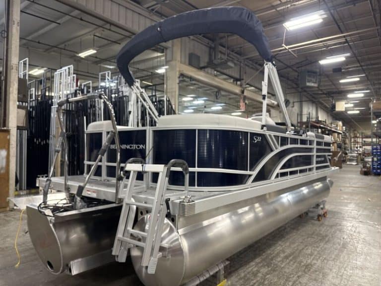 Pontoon boat at Hall's Sport Center, ideal for leisure and water adventures.