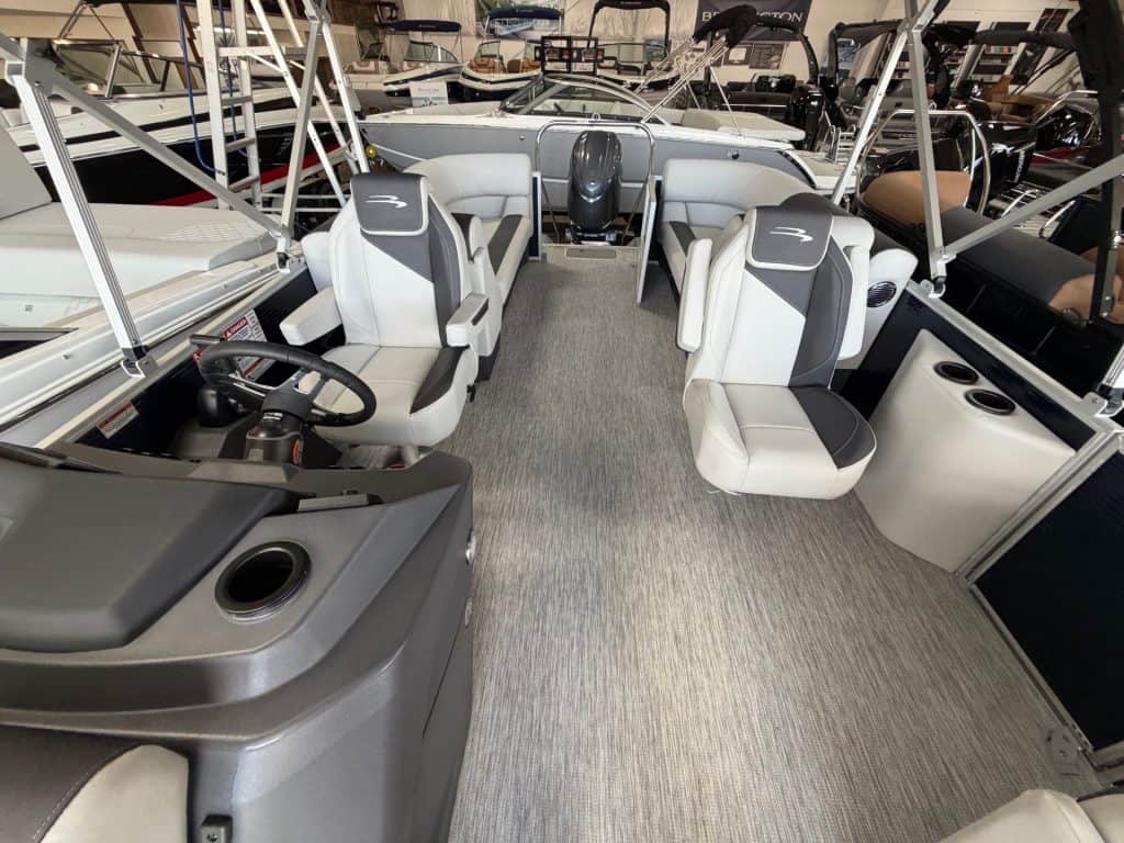 Modern Bennington 22SSR S1 pontoon boat displayed at Hall's Sport Center.