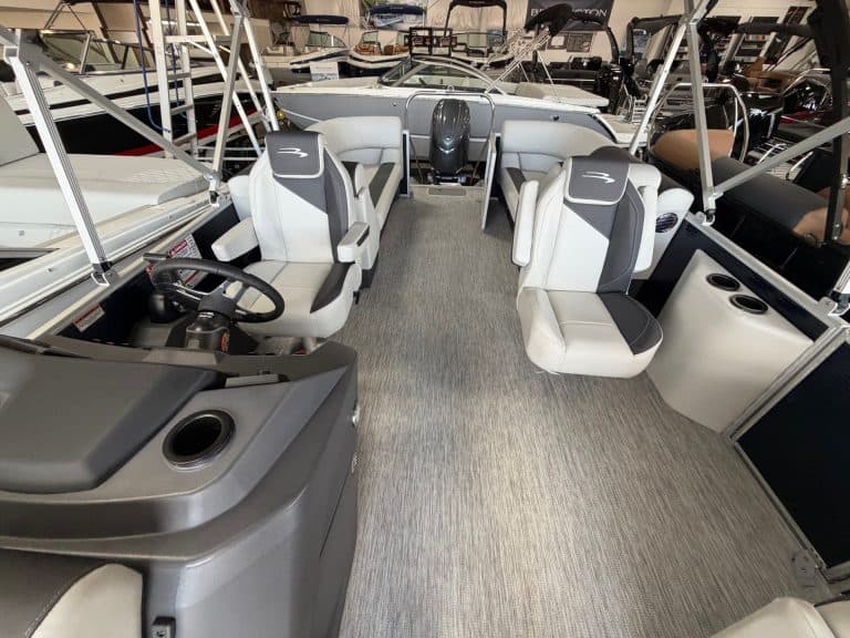 Modern Bennington 22SSR S1 pontoon boat displayed at Hall's Sport Center.