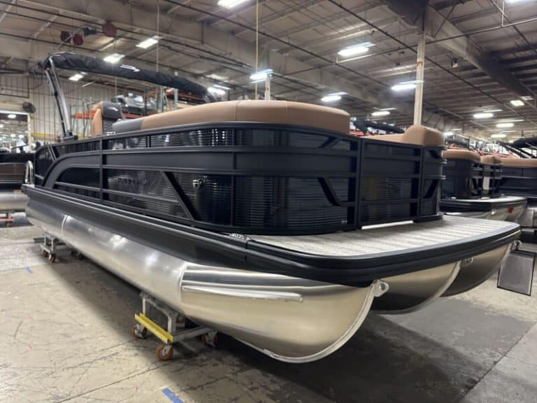 Bennington 23 SSB pontoon boat at Hall's Sport Center showroom.