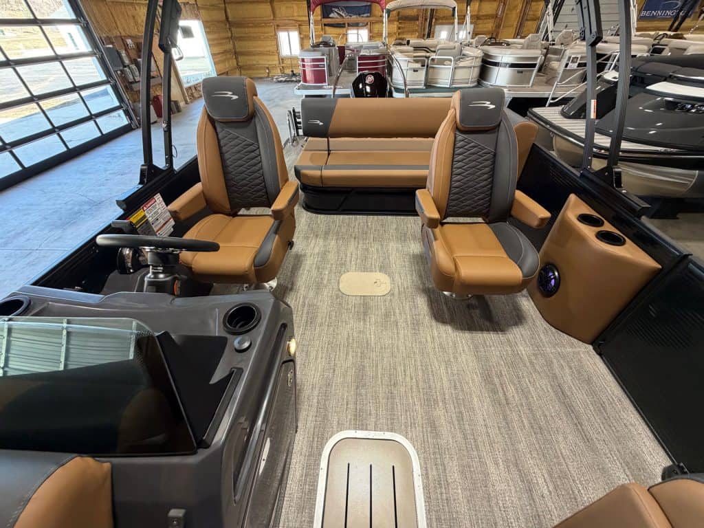 Bennington 23 SSB pontoon boat interior with spacious seating and modern controls. Perfect for famil.