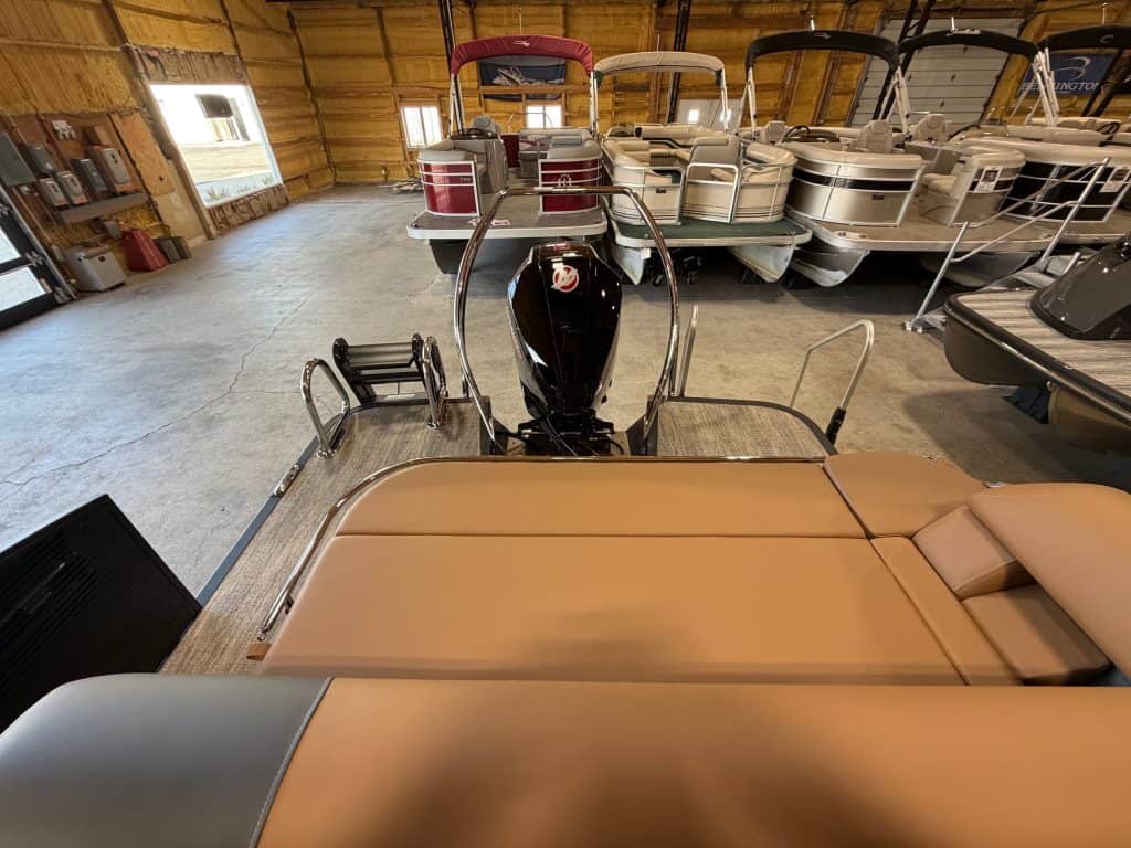 Bennington 23 SSB pontoon boat displayed at Hall's Sport Center showroom.