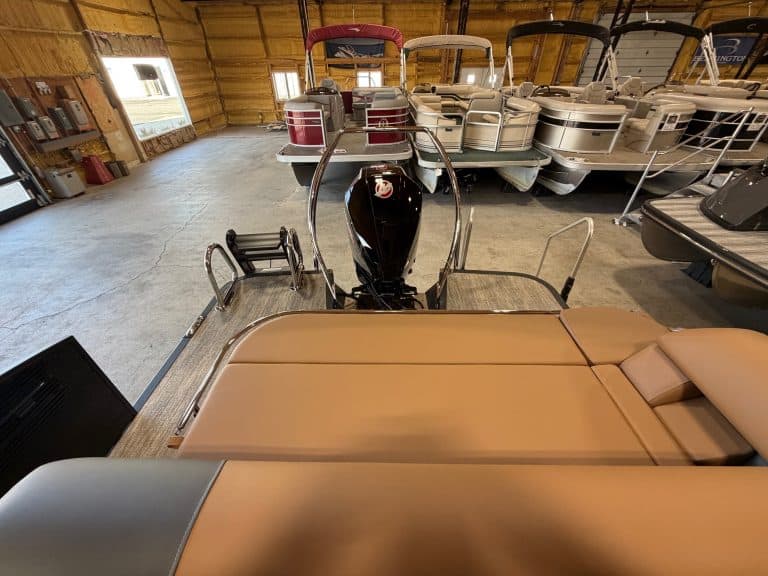 Bennington 23 SSB pontoon boat displayed at Hall's Sport Center showroom.